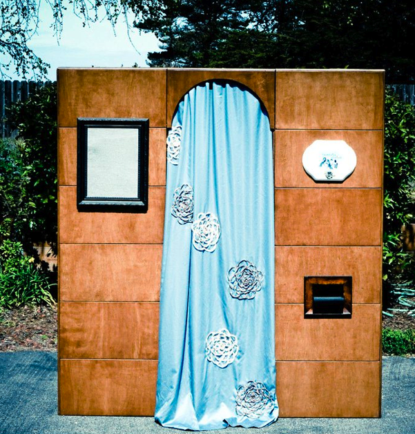 photobooth with blue curtain